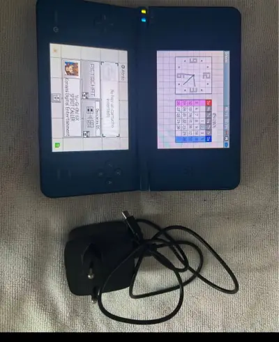 Consola Nintendo DSi XL azul con cargador desbloqu - miniatura 1