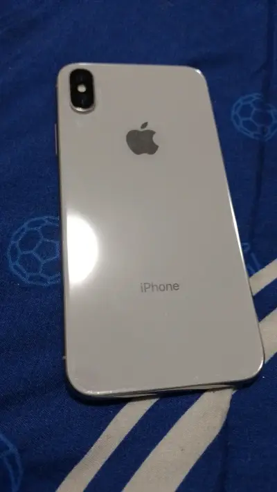 iPhone X en buen estado color plata - miniatura 2