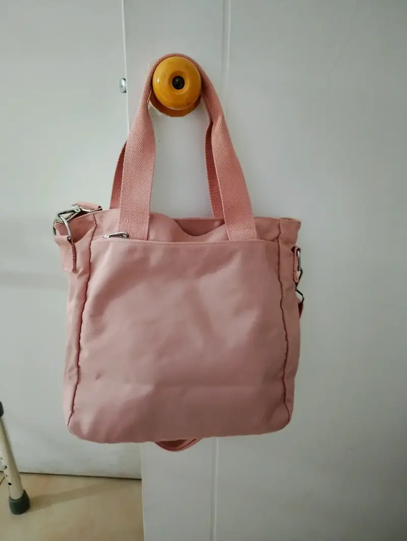 Bolso tote rosa con múltiples bolsillos - 2