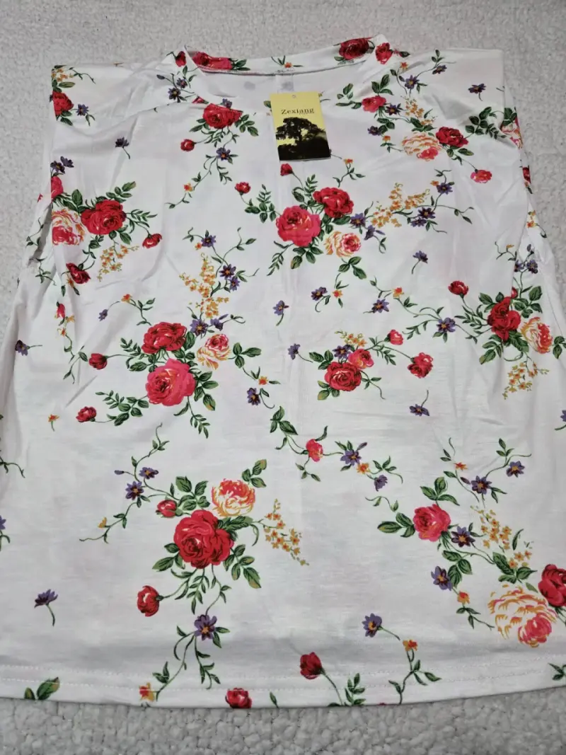 Polera sin mangas con estampado floral - 1