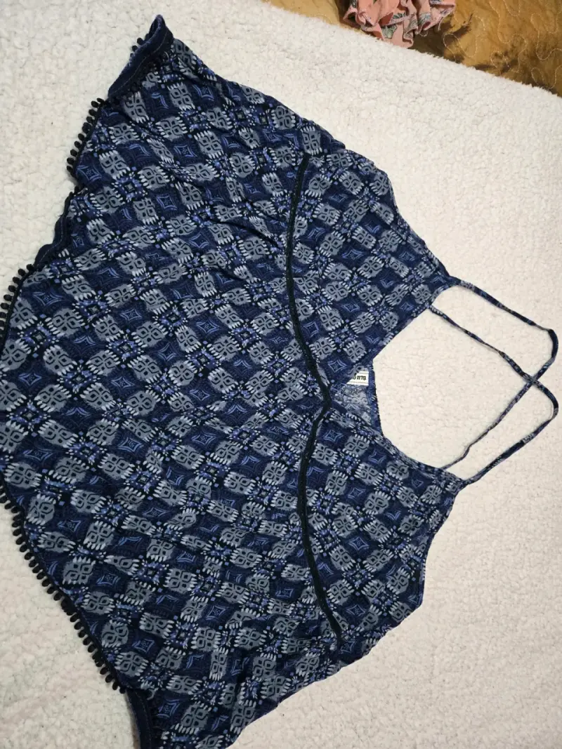 Polera sin mangas con estampado floral - 6