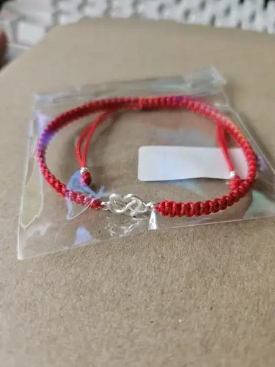 Pulsera roja con símbolo de corazón infinito plata - miniatura 3