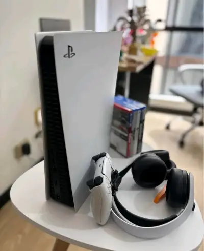Consola PlayStation 5 con juegos y accesorios - miniatura 4