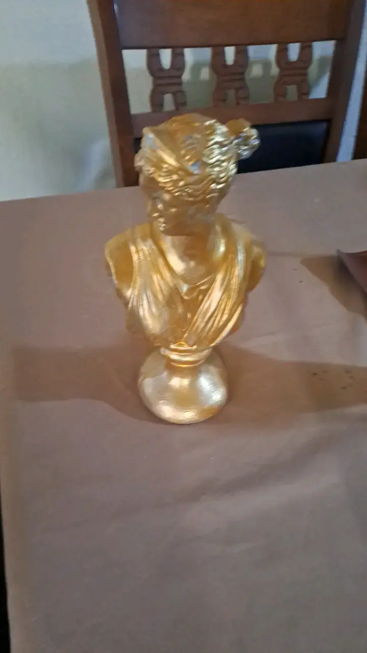 Busto decorativo dorado estilo clásico