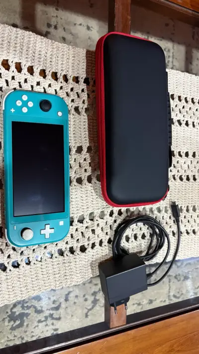 Nintendo Switch Lite turquesa desbloqueada( magia) - miniatura 1