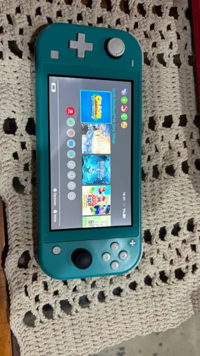 Nintendo Switch Lite turquesa desbloqueada( magia) - miniatura 2