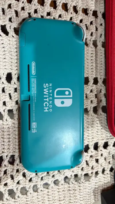 Nintendo Switch Lite turquesa desbloqueada( magia) - miniatura 3