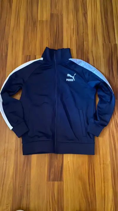 Chaqueta deportiva azul Puma con franjas - miniatura 1
