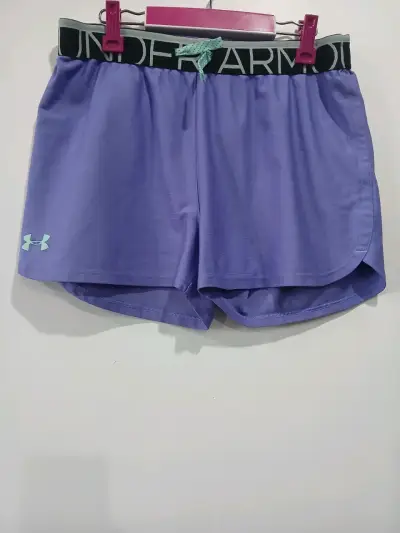 Shorts deportivos Under Armour morados para mujer - miniatura 1