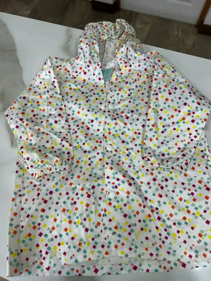 Chaqueta impermeable infantil Bumkins con diseño colorido - 1