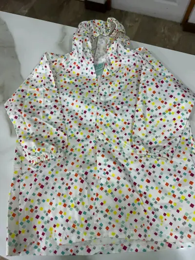 Chaqueta impermeable infantil Bumkins con diseño colorido - miniatura 1