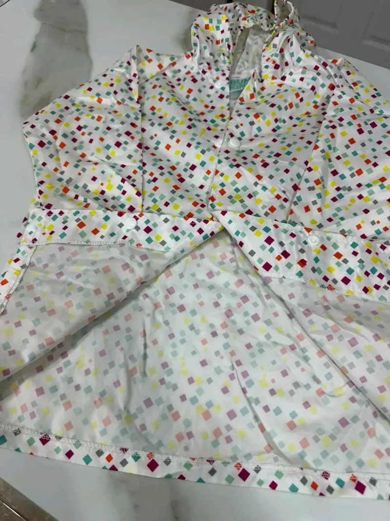 Chaqueta impermeable infantil Bumkins con diseño colorido - 2