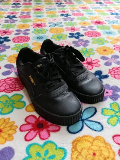 Zapatillas negras Puma para unisex - miniatura 1