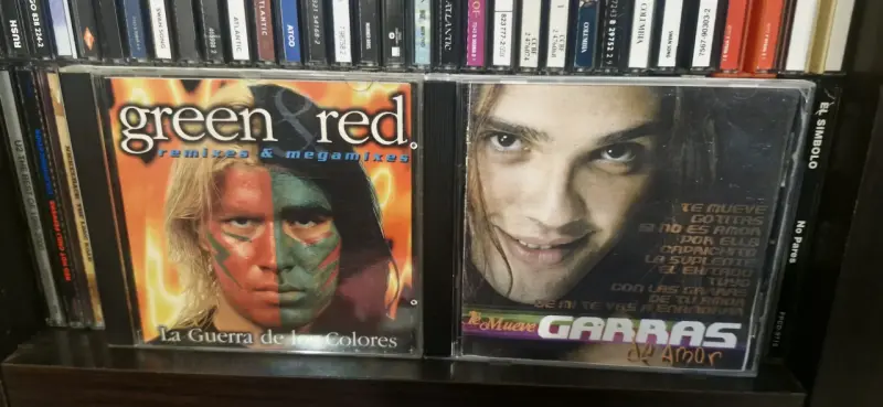 CD Green & Red Remixes y Garras de amor - 1