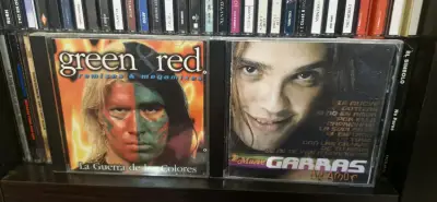 CD Green & Red Remixes y Garras de amor - miniatura 1