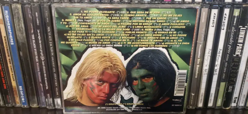 CD Green & Red Remixes y Garras de amor - 2