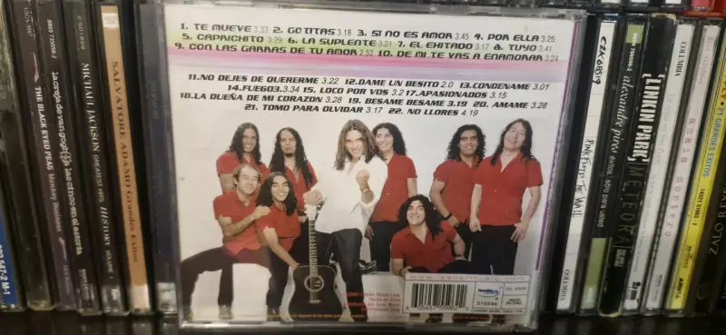CD Green & Red Remixes y Garras de amor - 3