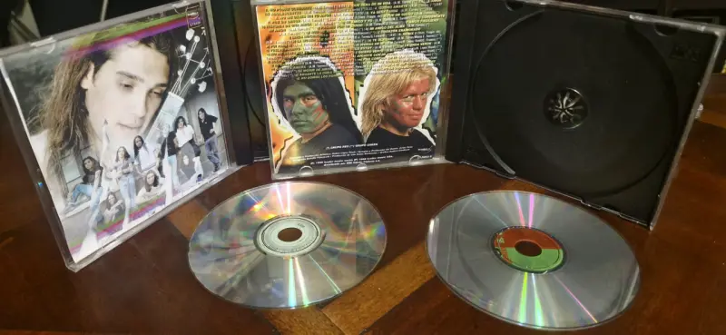 CD Green & Red Remixes y Garras de amor - 6