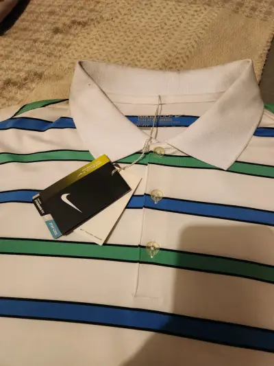 Polera Polo Nike Golf Rayada UPF 40+ - miniatura 1