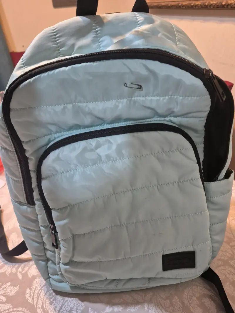 Mochila acolchada azul claro con múltiples bolsillos - 1