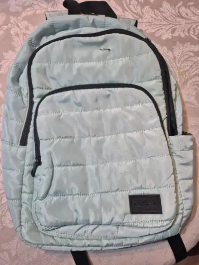 Mochila acolchada azul claro con múltiples bolsillos - miniatura 2