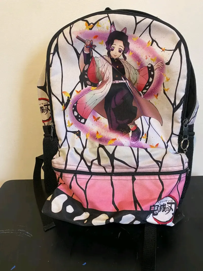 Mochila escolar anime con diseño colorido - 2
