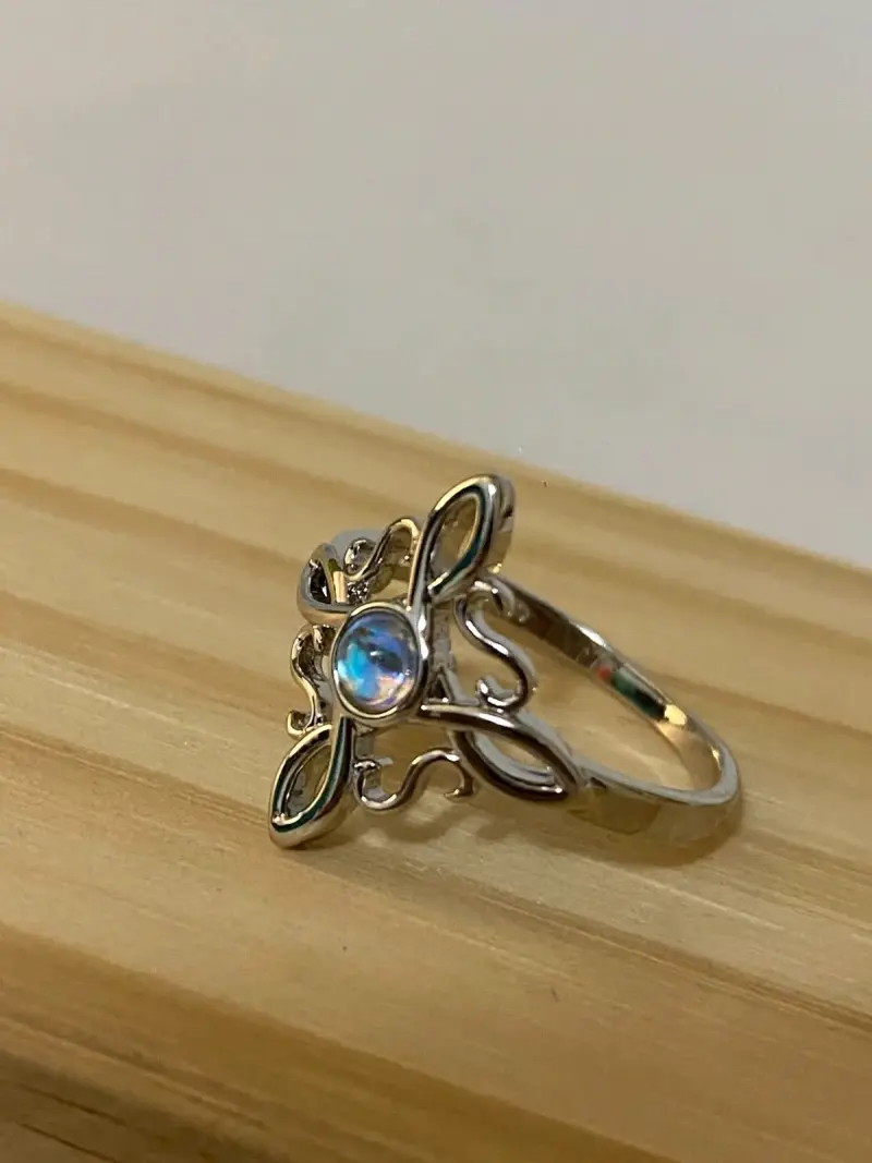 Anillo baño plata con diseño floral y piedra azul - 3