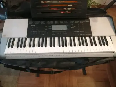 Teclado Casio CTK-4200 con soporte Quiklok - miniatura 1