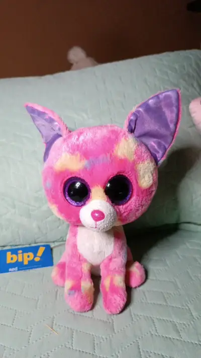 Peluche ojos brillantes multicolor - miniatura 1