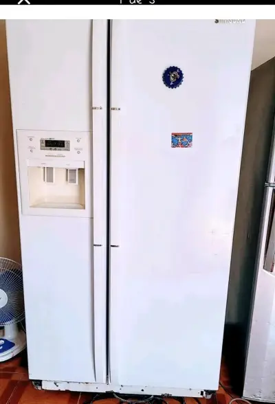 Refrigerador Side by Side Samsung con dispensador de agua - miniatura 1
