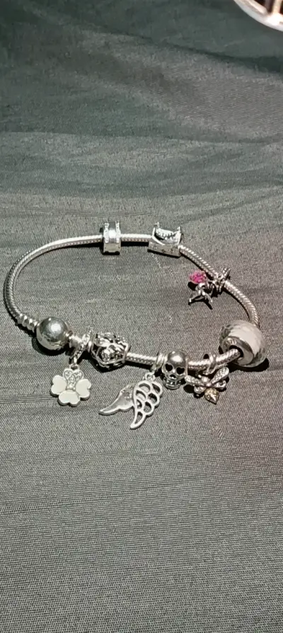 Pulsera de plata con dijes variados - miniatura 3