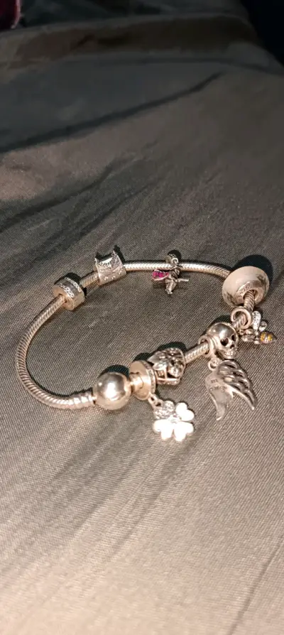 Pulsera de plata con dijes variados - miniatura 6
