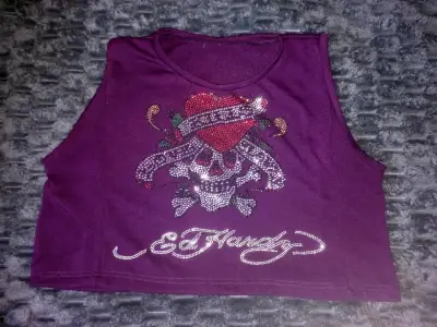 Polera sin mangas morada con diseño de cal - miniatura 1