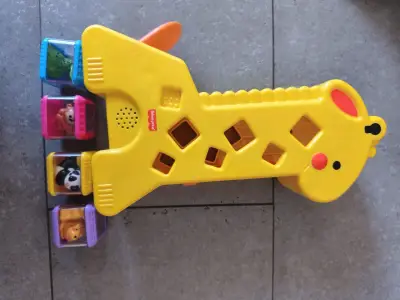 Juguete educativo jirafa Fisher-Price con bloques - miniatura 1