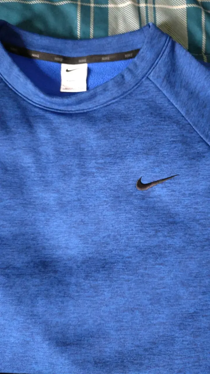 Polerón azul Nike con bolsillo lateral - 2