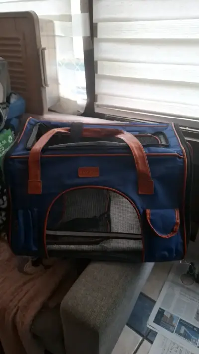 Transportadora de mascotas azul y naranja - miniatura 1