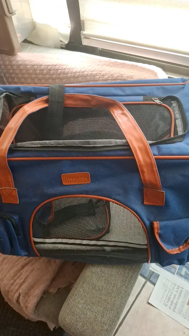 Transportadora de mascotas azul y naranja - 2