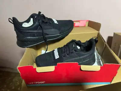 Zapatillas deportivas negras Puma - miniatura 1