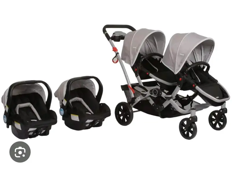 Coche doble con sillas de auto gris