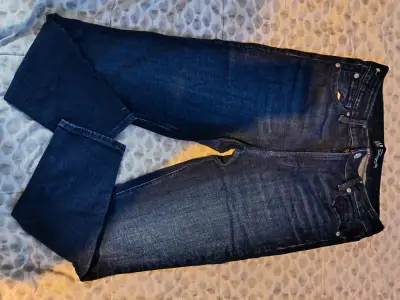 Jeans ajustados azul oscuro para mujer - miniatura 1