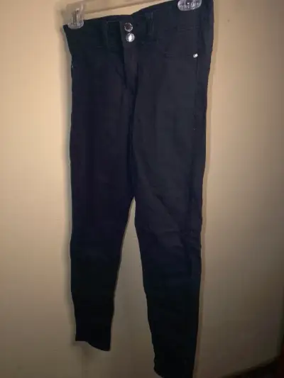 Pantalones negros ajustados para mujer - miniatura 1