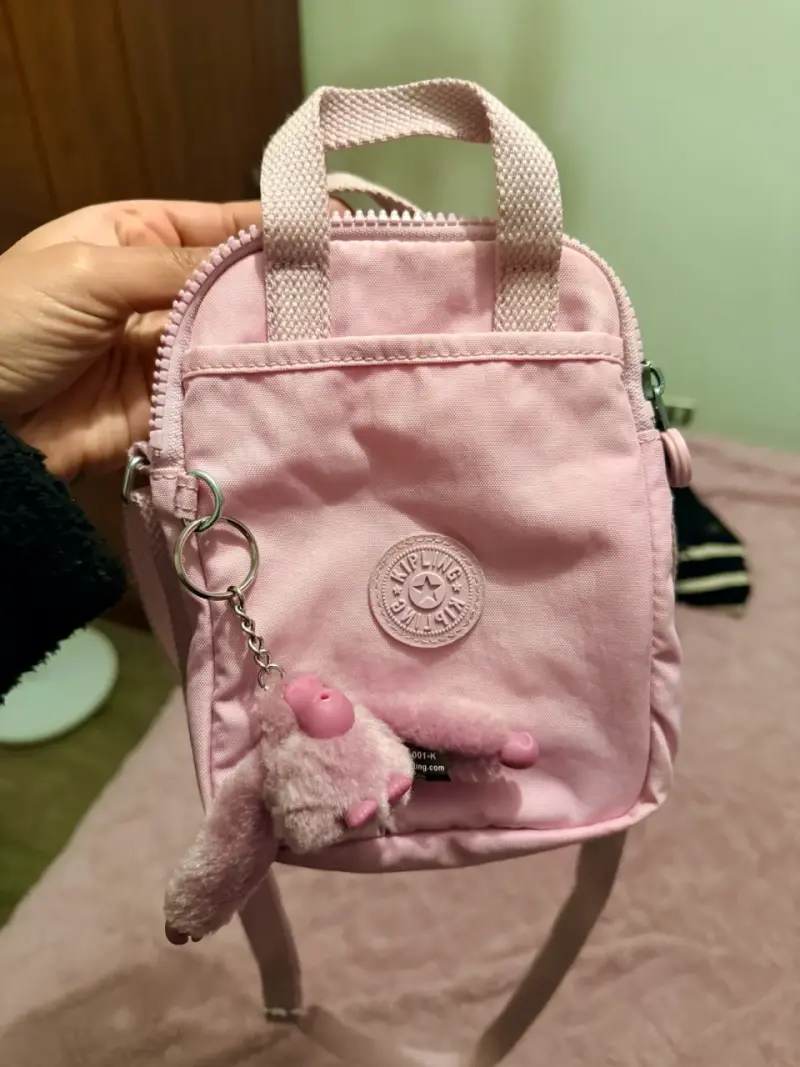 Mini cartera Kipling con llavero de mono - 1