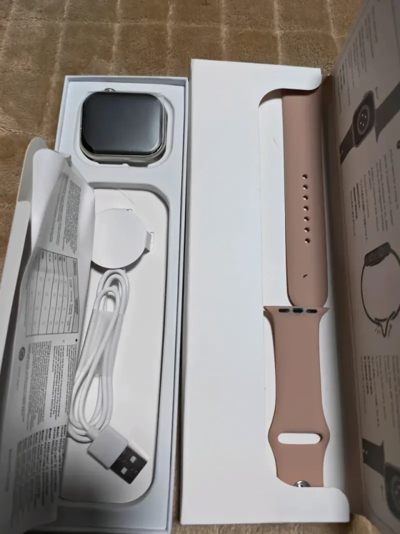 Smartwatch con correa rosa y cargador - 1