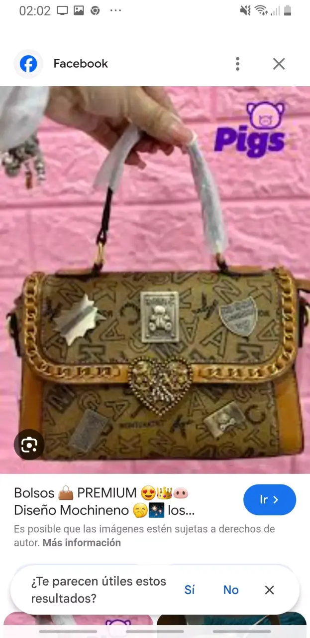 Bolso de mano con diseño premium y detalles dorados - 1