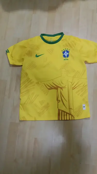 Polera de fútbol Brasil Nike amarilla y negra - miniatura 1