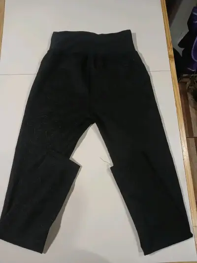 Pantalones negros con cierre decorativo - miniatura 2