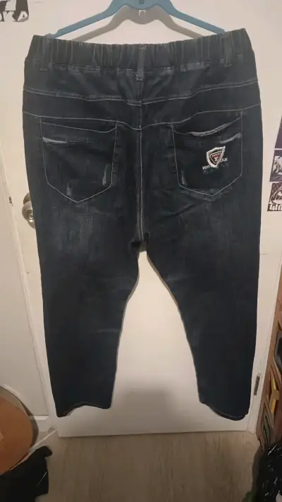 Jeans oscuros con diseño bordado - miniatura 2