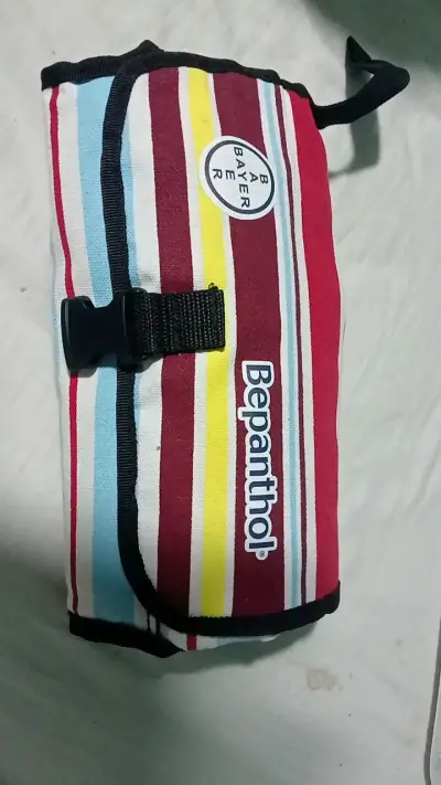 Cambiador portátil Bepanthol a rayas - miniatura 1