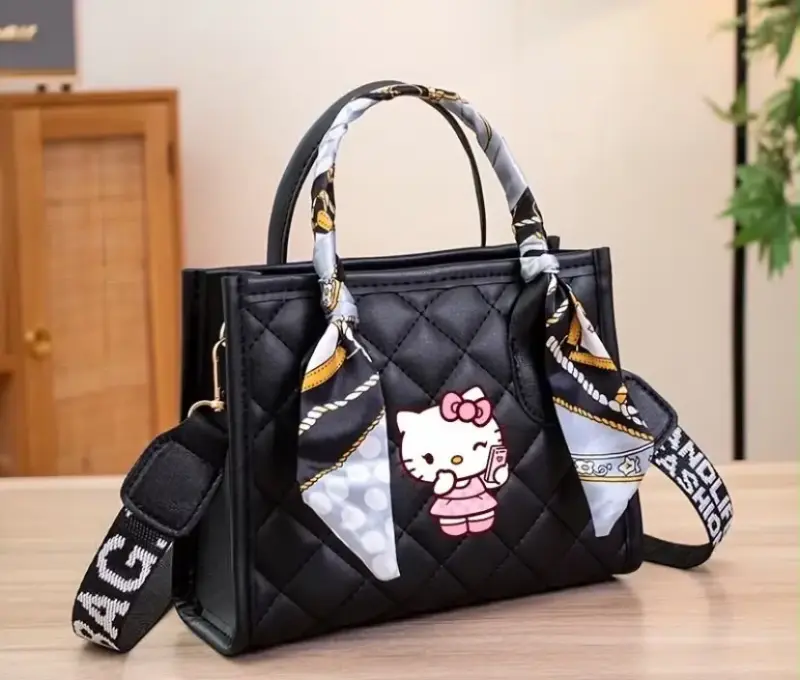 Bolso de mano negro con diseño Hello Kitty