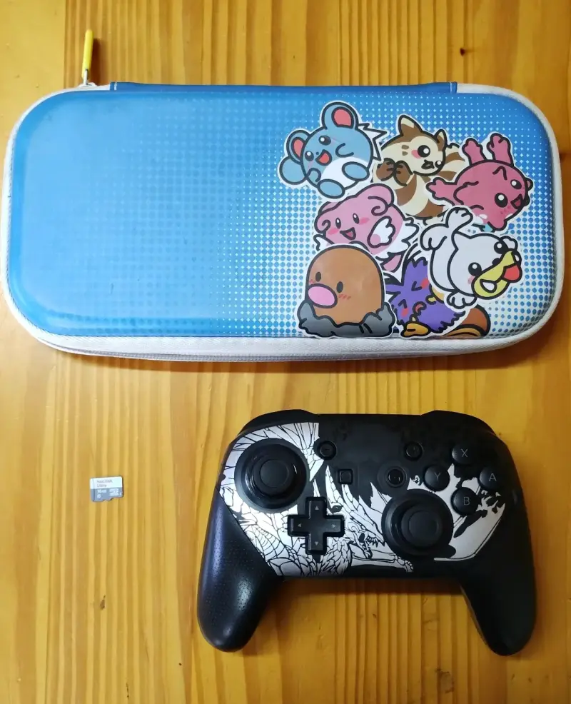 Nintendo Switch+ 3 juegos Físicos+ Accesorios - 5